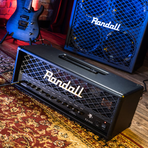 Randall amplifier head on floor in front of amplifier and electric guitar